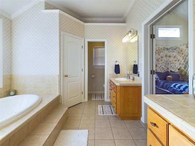 bathroom with vanity, crown molding, tile patterned floors, and tiled bath