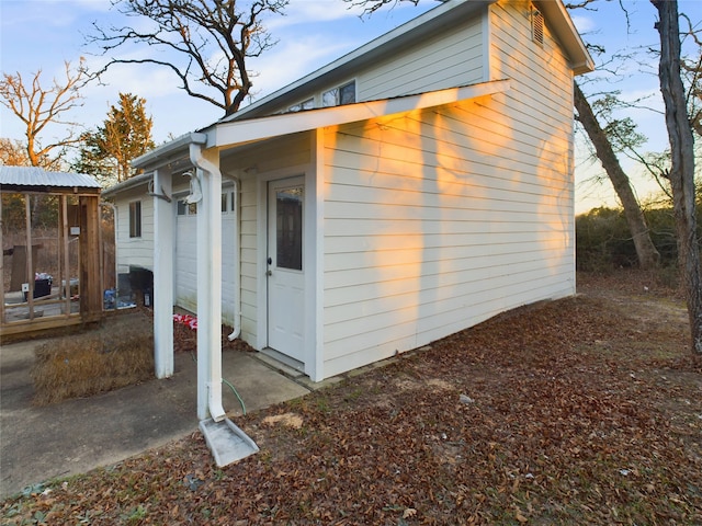 view of property exterior at dusk