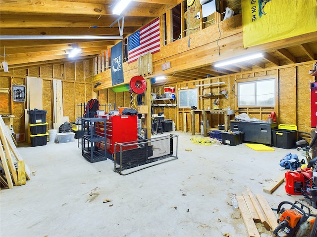 garage with a workshop area