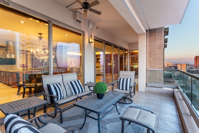 exterior space featuring an outdoor living space and ceiling fan