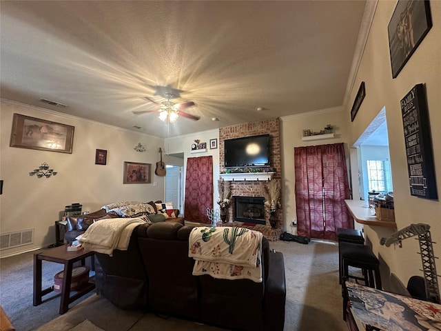 living room featuring ornamental molding, a fireplace, and carpet floors