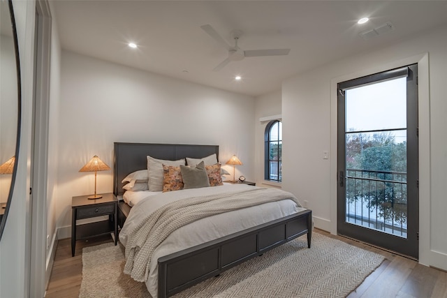 bedroom featuring light wood-type flooring, access to exterior, and ceiling fan