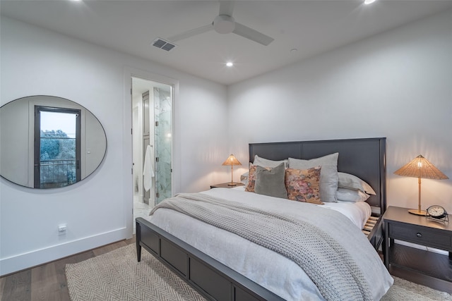 bedroom featuring wood-type flooring, ceiling fan, and ensuite bathroom