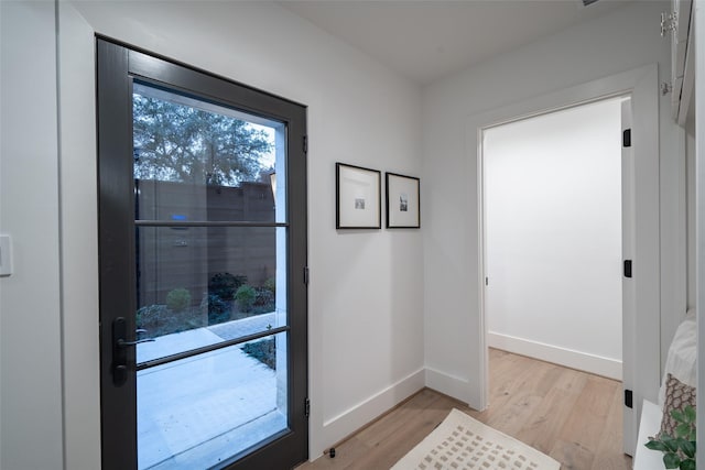 doorway featuring light hardwood / wood-style flooring