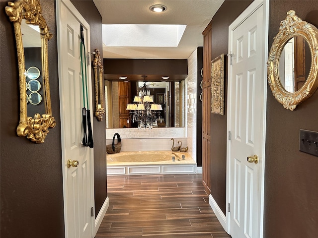 corridor featuring dark hardwood / wood-style floors