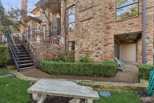 exterior space with ceiling fan