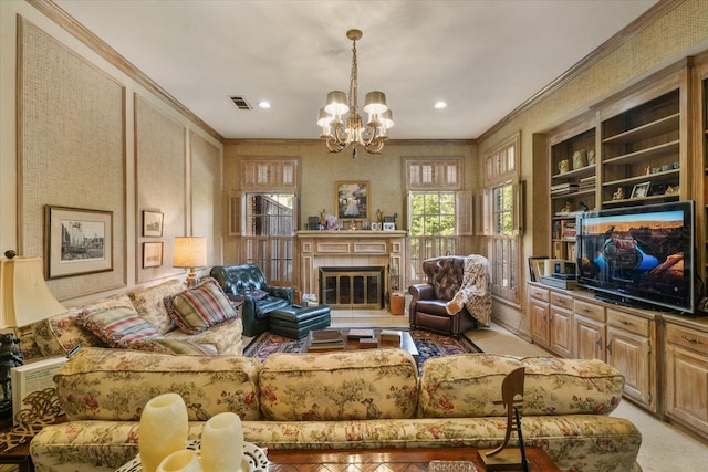 living room with an inviting chandelier, crown molding, light carpet, and a tile fireplace