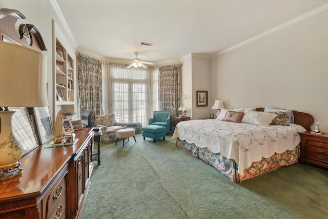 bedroom featuring crown molding, ceiling fan, and carpet floors