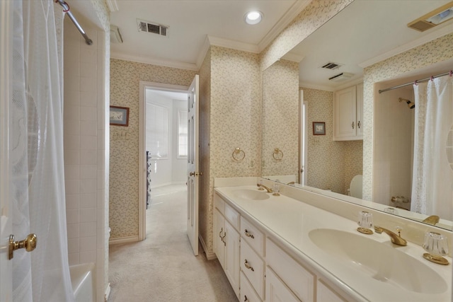 bathroom featuring crown molding, vanity, and shower / bath combo with shower curtain