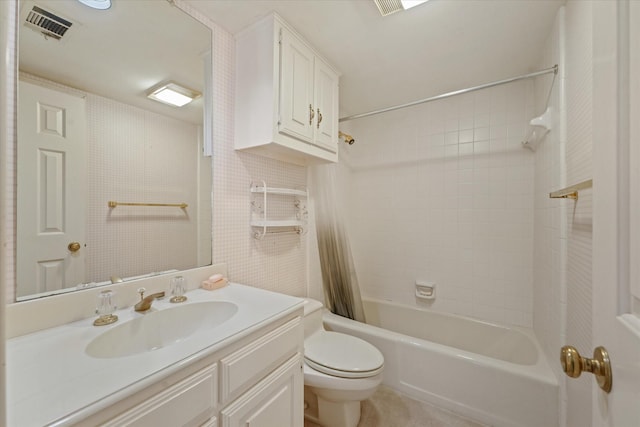 full bathroom featuring vanity, toilet, and shower / bath combo