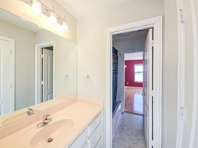 bathroom with vanity and a shower with shower curtain