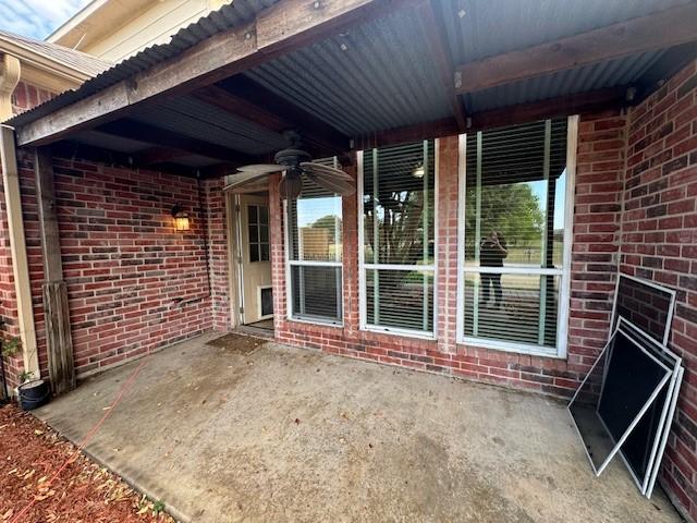 view of patio / terrace with a ceiling fan
