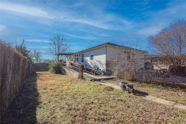 view of home's exterior with a yard