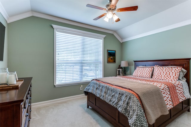 bedroom featuring light carpet, ceiling fan, vaulted ceiling, and multiple windows