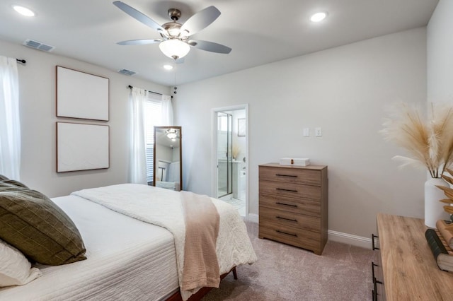 carpeted bedroom featuring ceiling fan and connected bathroom