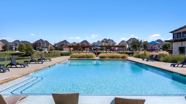 view of pool featuring a patio area