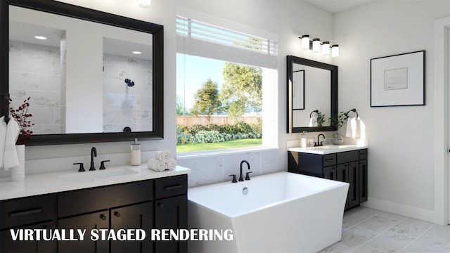 bathroom with vanity and a tub