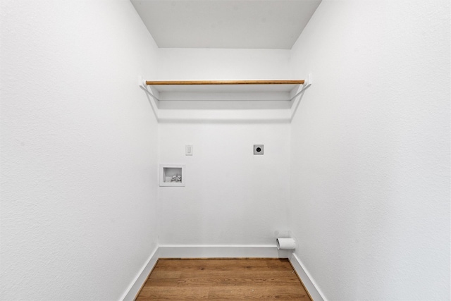 laundry area featuring hookup for a washing machine, hardwood / wood-style floors, and electric dryer hookup