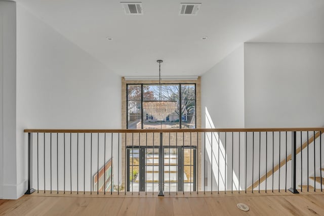 details with wood-type flooring