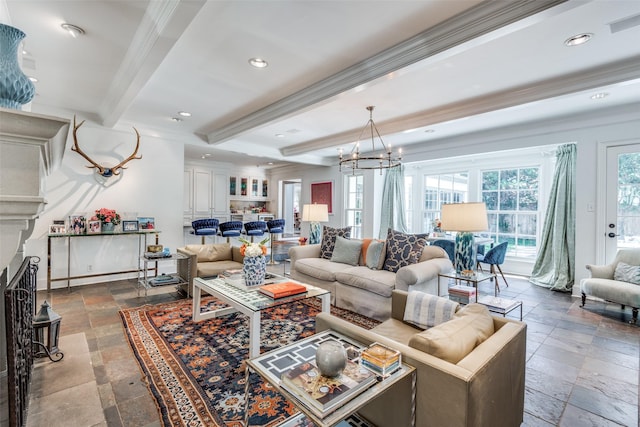 living room featuring crown molding, a notable chandelier, and beam ceiling