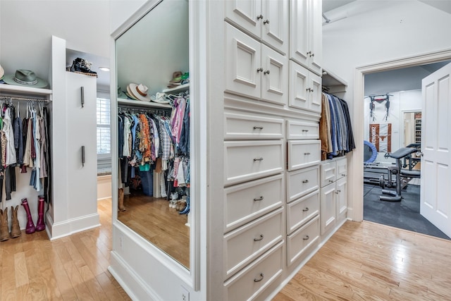 walk in closet featuring light hardwood / wood-style floors