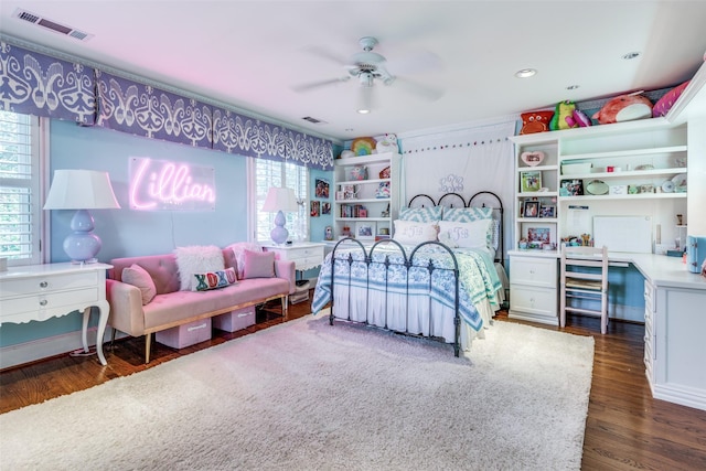 bedroom with dark wood-type flooring and ceiling fan