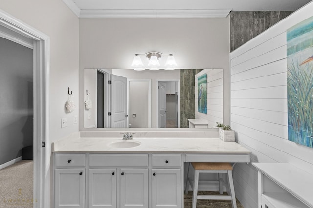 bathroom with vanity and crown molding