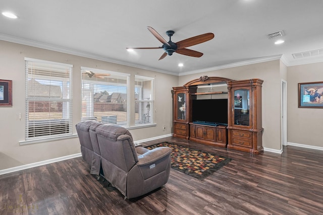 living room featuring ceiling fan, ornamental molding, and dark hardwood / wood-style flooring