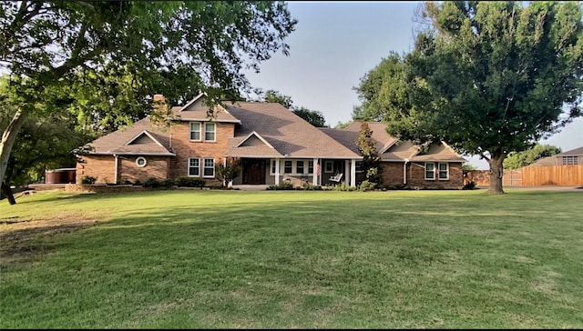 view of front of home with a front yard