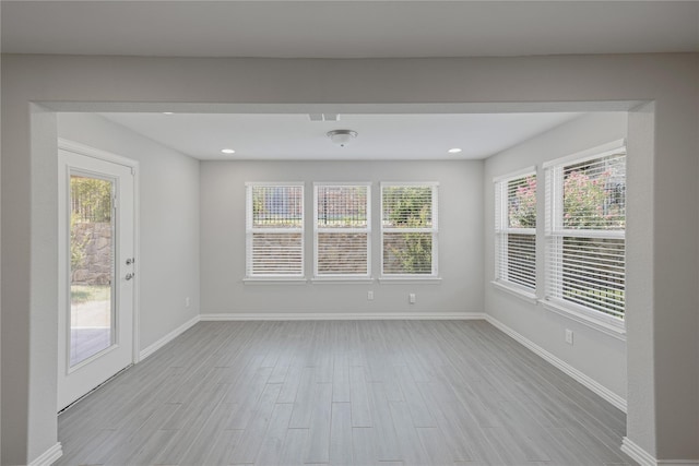 spare room with plenty of natural light