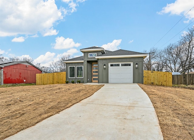 view of front of property featuring a garage