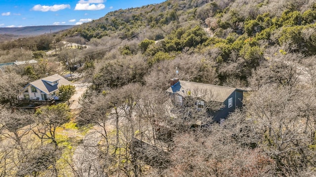 birds eye view of property with a mountain view