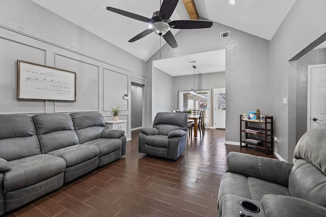 living room with lofted ceiling with beams and ceiling fan