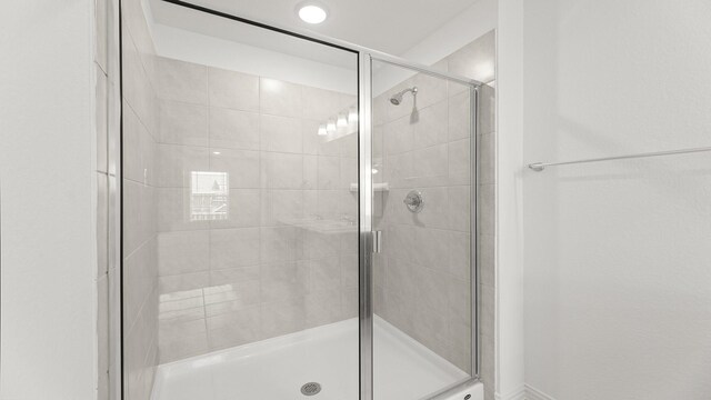 bathroom featuring a stall shower