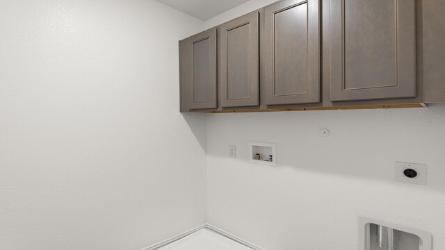 laundry area featuring cabinet space, electric dryer hookup, washer hookup, and gas dryer hookup