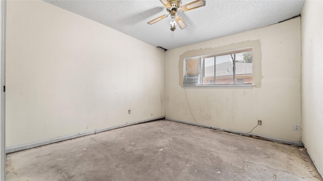 spare room featuring ceiling fan and a textured ceiling