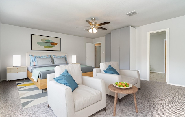 bedroom with a ceiling fan, carpet, visible vents, and baseboards