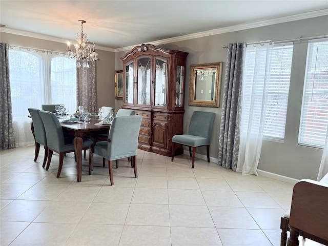 dining space with light tile patterned floors, plenty of natural light, and crown molding