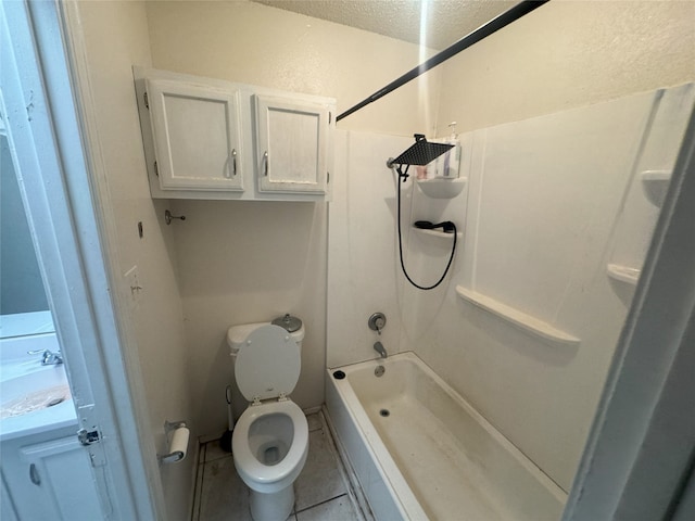 full bathroom with shower / washtub combination, vanity, toilet, tile patterned floors, and a textured ceiling