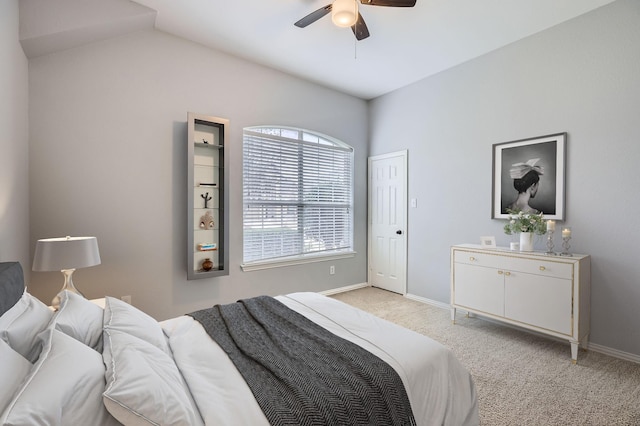 bedroom featuring ceiling fan and light colored carpet