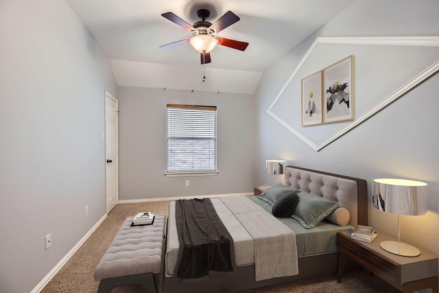 carpeted bedroom with lofted ceiling and ceiling fan