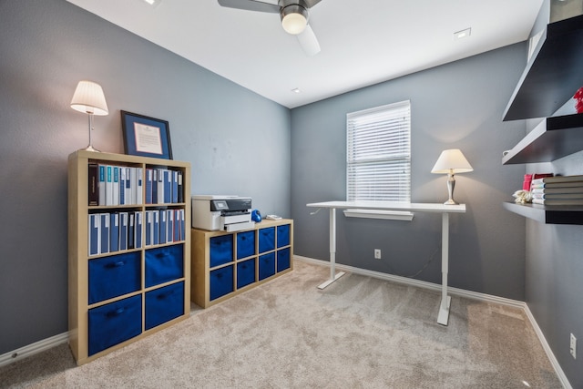 interior space featuring carpet floors and ceiling fan