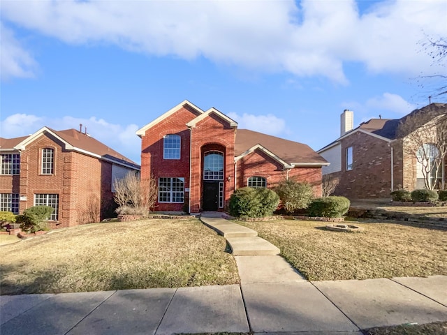 front of property featuring a front lawn