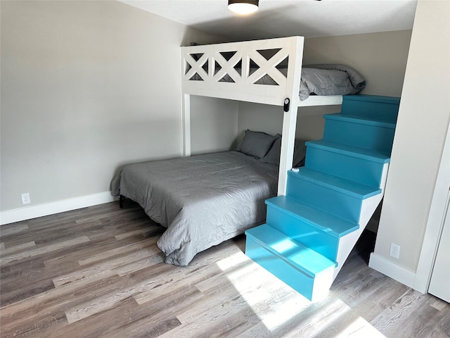 bedroom featuring hardwood / wood-style floors