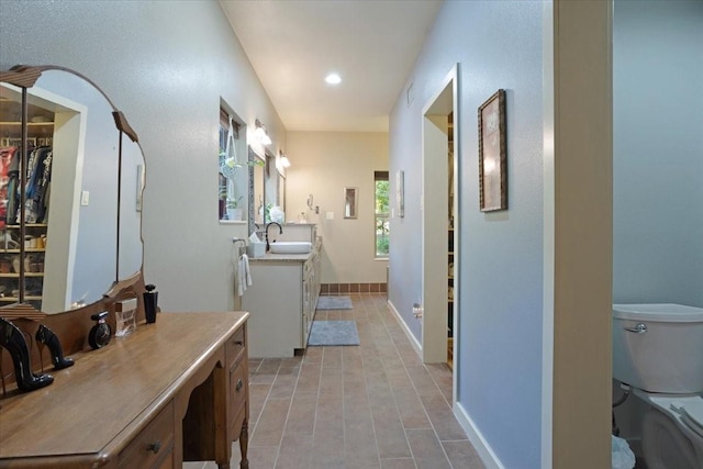 bathroom featuring vanity and tile patterned flooring