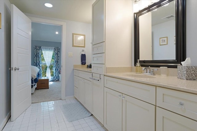 bathroom featuring vanity and tile patterned flooring