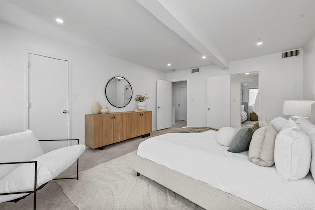 carpeted bedroom featuring beamed ceiling