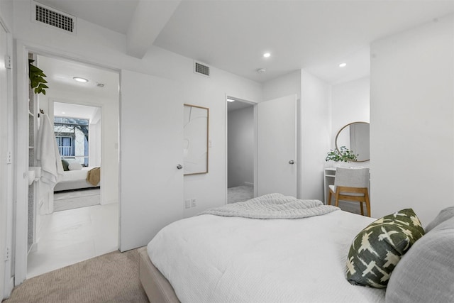 bedroom featuring beam ceiling