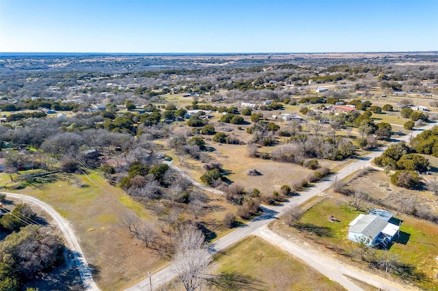 birds eye view of property featuring a rural view