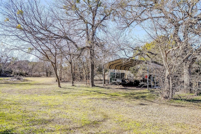 view of yard with a carport